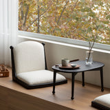 Cozy Bay Window Nook Set with Cushioned Floor Chair and Wooden Tea Table